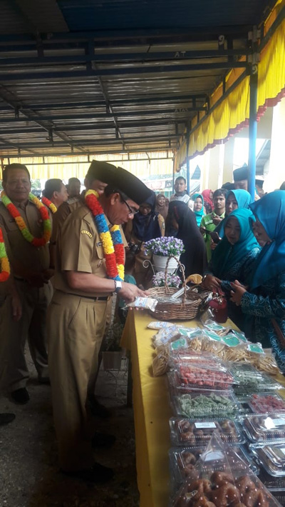 Hadiri Musrenbangcam, Bupati Mursini Disuguhi Makanan Khas Masyarakat Sentajo Raya 